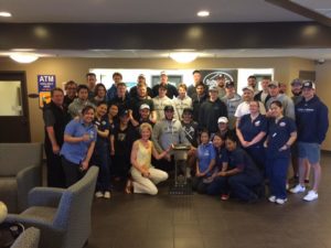 Warriors and hotel staff